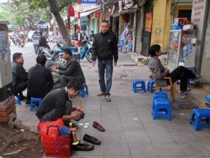 Vendor in Hanoi by Julia Suh